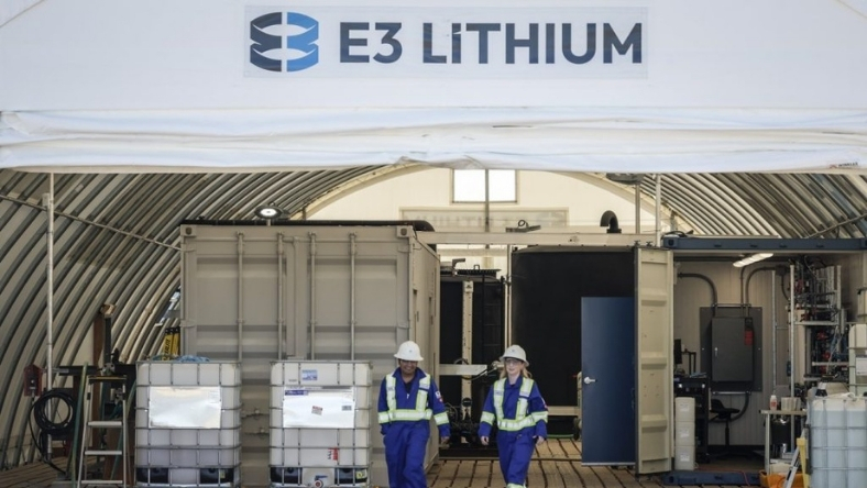 E3 Lithium facility with workers beside industrial processing units